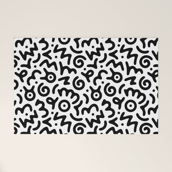 Fun black and white doodle symbol art pattern Welcome Mat Gallery Image 1