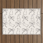 Ribbon Bows and Bunnies in Black and Linen White Outdoor Rug Gallery Image 1
