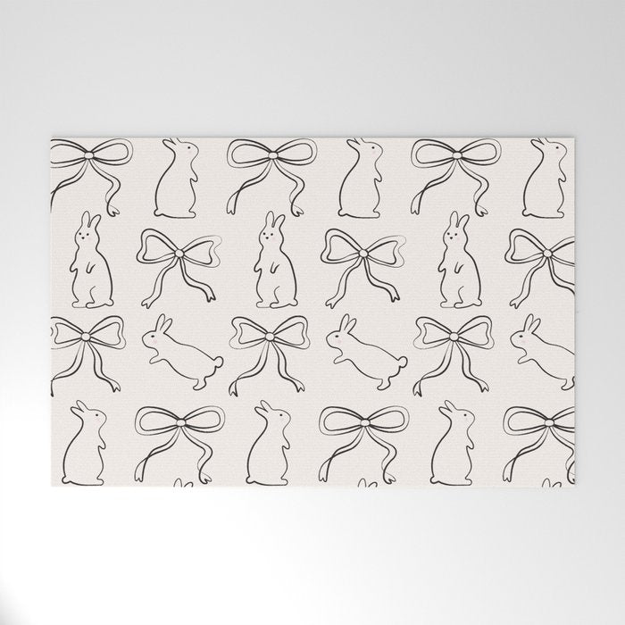 Ribbon Bows and Bunnies in Black and Linen White Welcome Mat Gallery Image 1