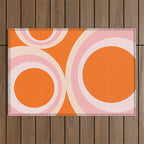 Calida - Retro Geometric Circle Pattern in Orange and Pink Outdoor Rug Gallery Image 1
