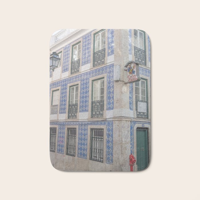 Blue azulejos on a corner building in Alfama, Lisbon, Portugal - street and travel photography Bath Mat Gallery Image 1