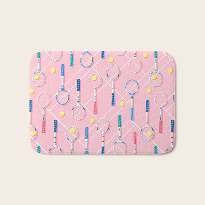 Collection of Retro Tennis Racquets on Pink Bath Mat Gallery Image 1