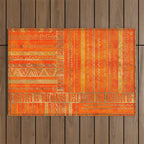 Tribal Ethnic pattern gold on bright orange Outdoor Rug Gallery Image 1