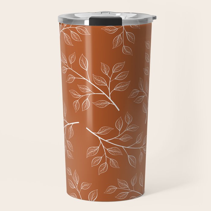 Delicate White Leaves and Branch on a Rust Orange Background Travel Mug Gallery Image 1