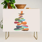 Bird nesting on top of pebbles hill Credenza Gallery Image 1