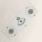 Evil Eye Collection on White Yoga Mat Gallery Image 1