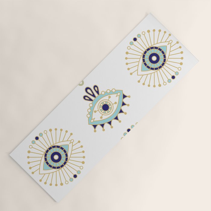 Evil Eye Collection on White Yoga Mat Gallery Image 1