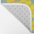 Puakenikeni lei drape on blue Bath Mat Gallery Image 2