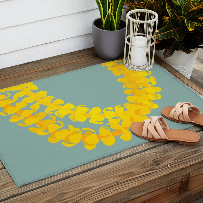 Puakenikeni lei drape on blue Outdoor Rug Gallery Image 2