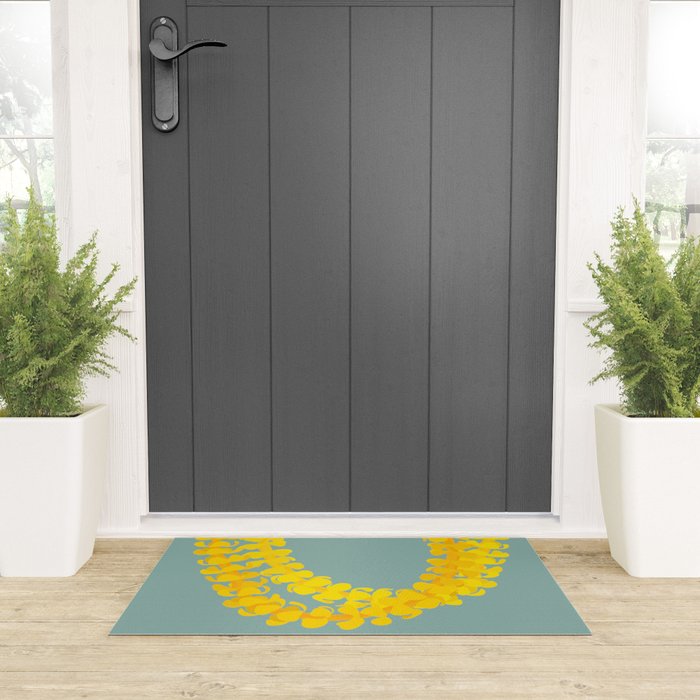 Puakenikeni lei drape on blue Welcome Mat Gallery Image 3