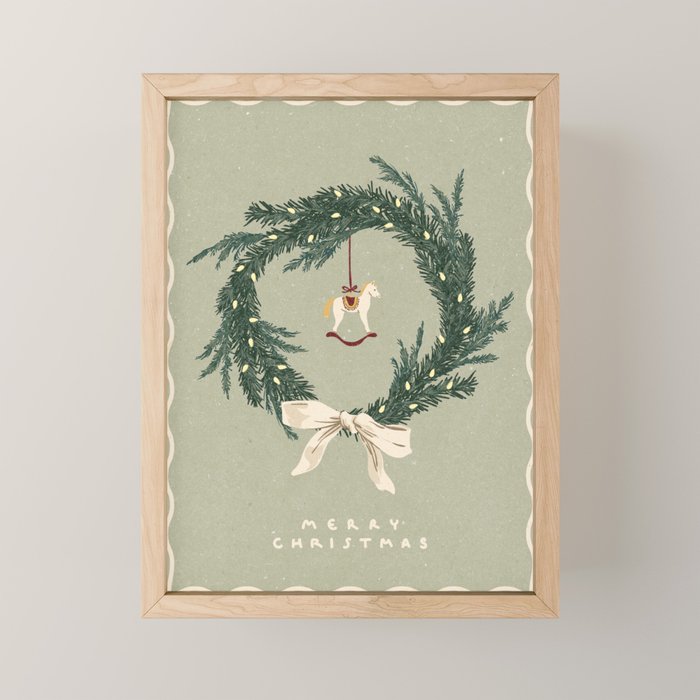 Horses toy on Christmas wreath with bow Mini Art Print Gallery Image 1