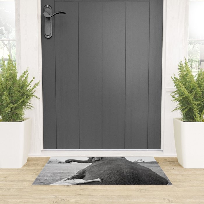 Odd Best Friends, Sweet Little Girl hugging elephant black and white photograph Welcome Mat Gallery Image 3
