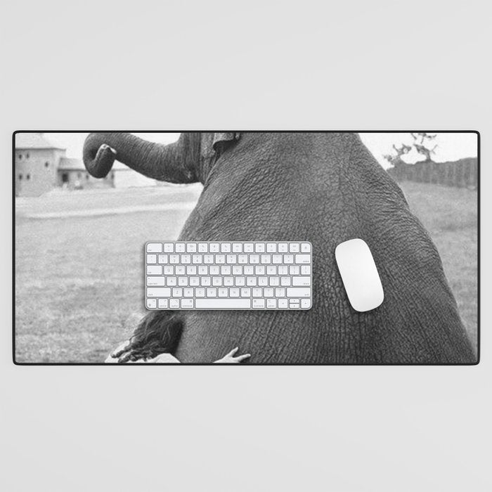 Odd Best Friends, Sweet Little Girl hugging elephant black and white photograph Desk Mat Gallery Image 1