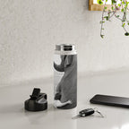 Odd Best Friends, Sweet Little Girl hugging elephant black and white photograph Water Bottle Gallery Image 4