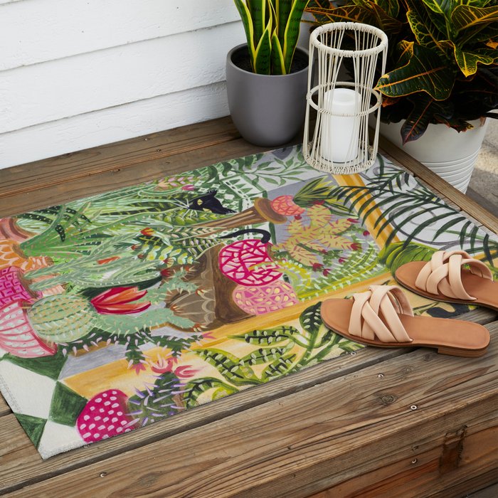 Black cat in the Garden Outdoor Rug Gallery Image 2