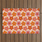 Groovy Flowers Print in Pink Outdoor Rug Gallery Image 1