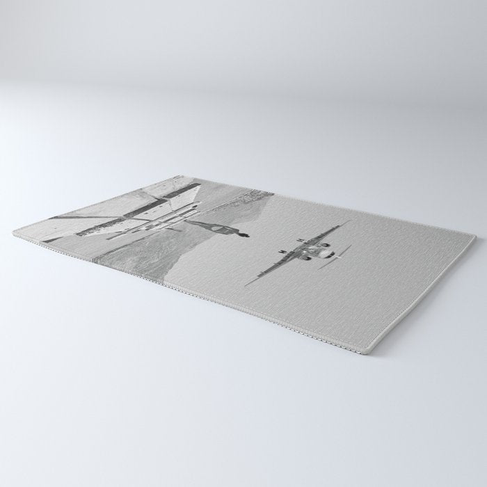 Steady As She Goes; aircraft coming in for an island landing black and white photography- photographs Rug Gallery Image 3
