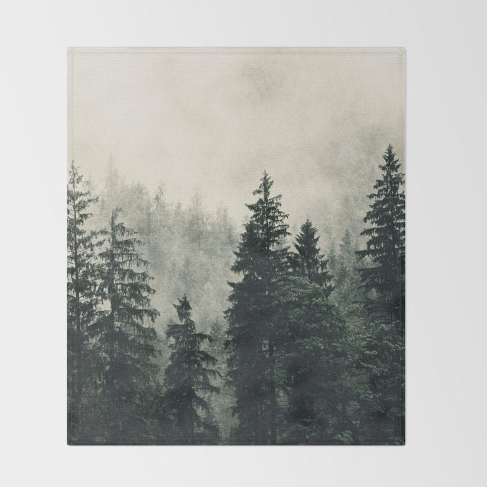 Thick pine forest in the descending mist Throw Blanket Gallery Image 2