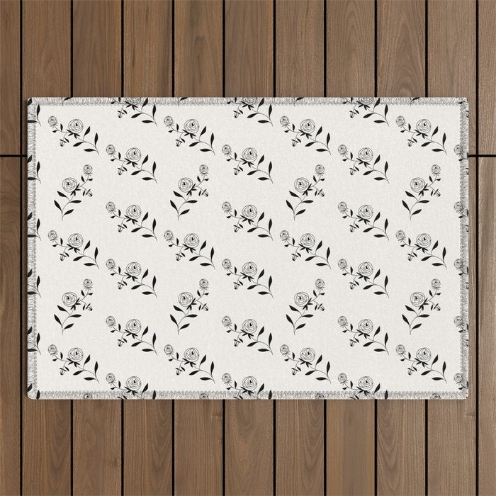 Abstract Rose Pattern - Black and Ivory Outdoor Rug Gallery Image 1