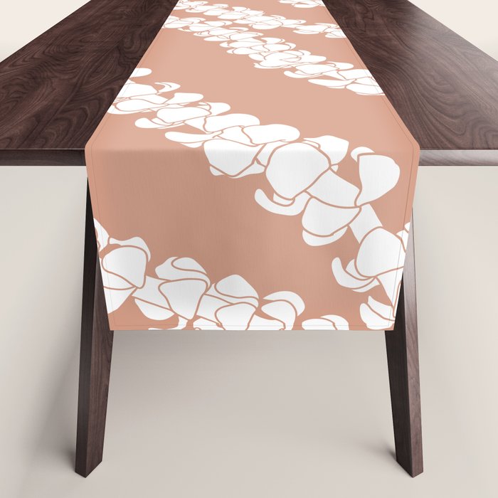 Puakenikeni single lei art on Coral Dust Table Runner Gallery Image 1