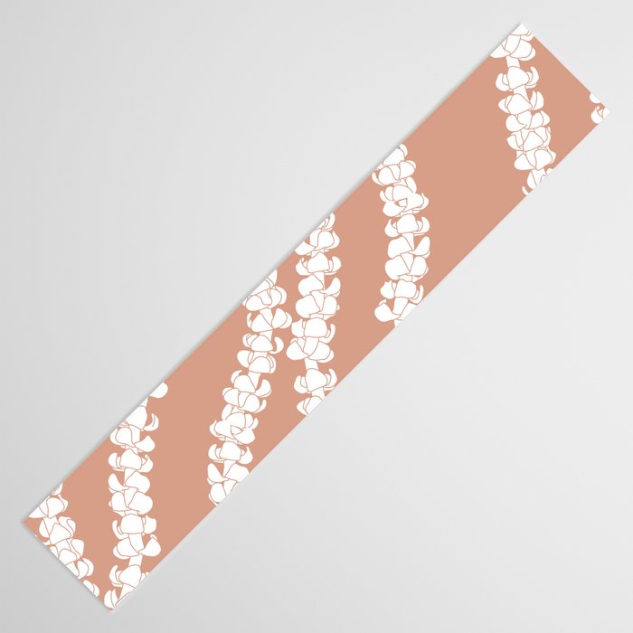 Puakenikeni single lei art on Coral Dust Table Runner Gallery Image 3
