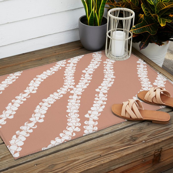 Puakenikeni single lei art on Coral Dust Outdoor Rug Gallery Image 2