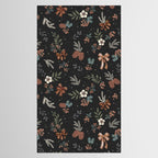 Vintage Winter Foliage with Berries, Pinecones and Ribbons on Black Tablecloth Gallery Image 2