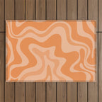 Retro Liquid Swirl Abstract Pattern in Muted Apricot Orange Outdoor Rug Gallery Image 1