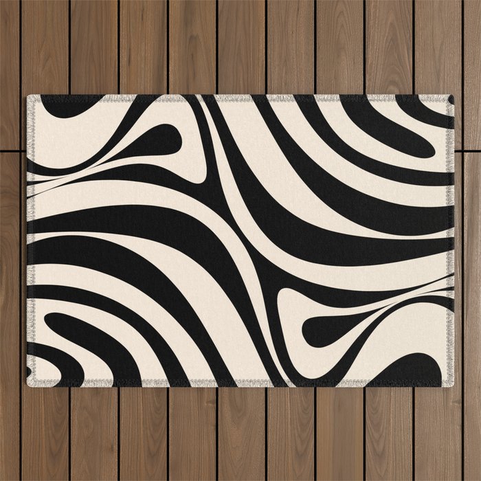 New Groove Retro Swirl Abstract Black and Almond Cream Outdoor Rug Gallery Image 1