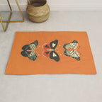 Butterflies in orange Rug Gallery Image 1