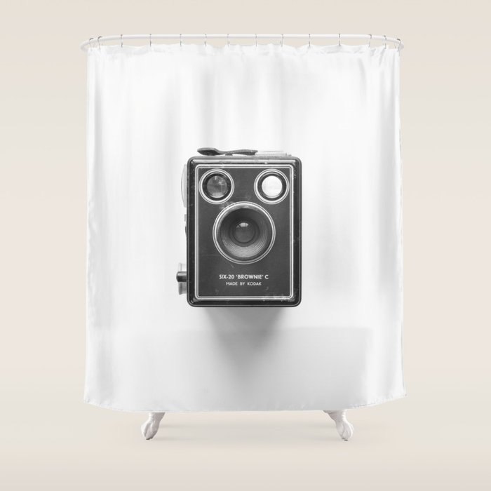 A Kodak Brownie analog vintage camera on a white background  Retro photography in black and white Shower Curtain Gallery Image 1