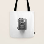 A Kodak Brownie analog vintage camera on a white background  Retro photography in black and white Tote Bag Gallery Image 1