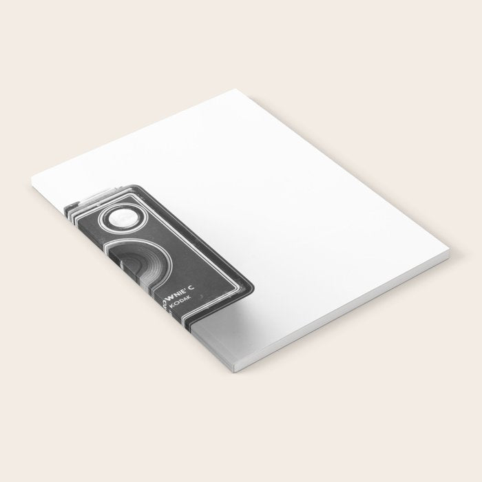 A Kodak Brownie analog vintage camera on a white background  Retro photography in black and white Notebook Gallery Image 1