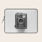 A Kodak Brownie analog vintage camera on a white background  Retro photography in black and white Laptop Sleeve Gallery Image 1