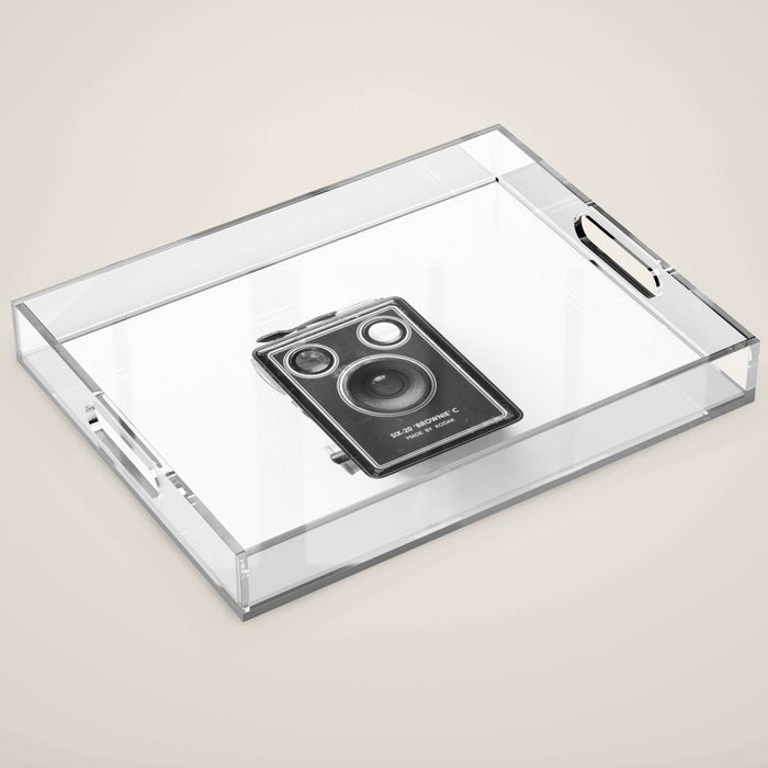 A Kodak Brownie analog vintage camera on a white background  Retro photography in black and white Acrylic Tray Gallery Image 1
