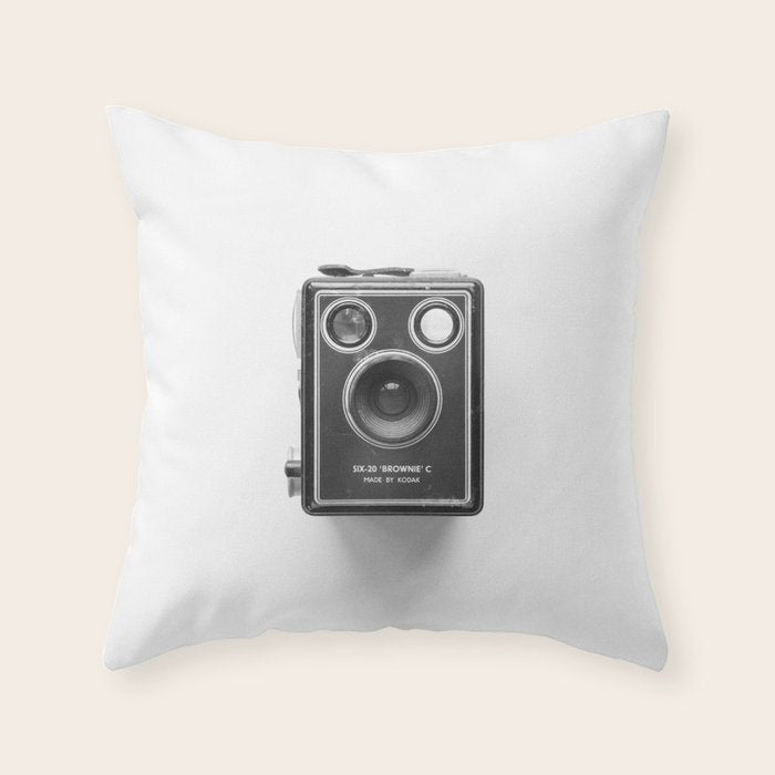 A Kodak Brownie analog vintage camera on a white background  Retro photography in black and white Throw Pillow Gallery Image 6