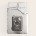 A Kodak Brownie analog vintage camera on a white background  Retro photography in black and white Comforter Gallery Image 6