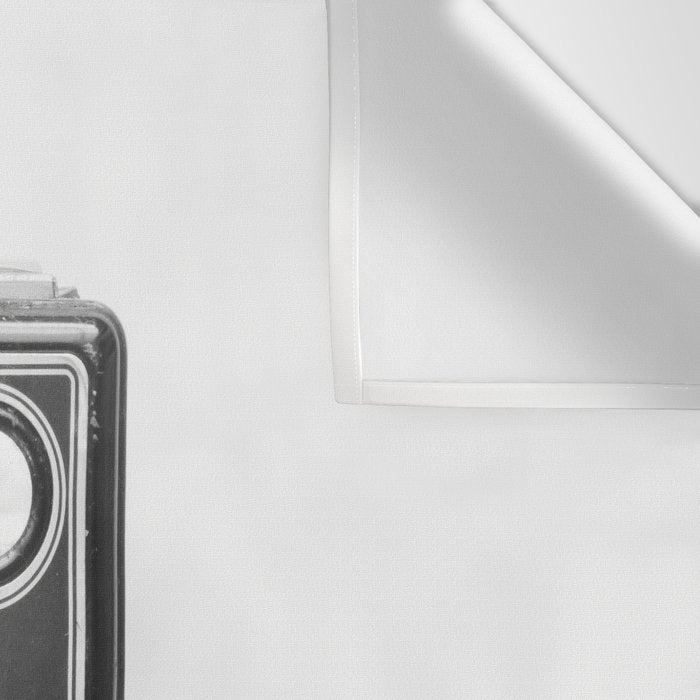 A Kodak Brownie analog vintage camera on a white background  Retro photography in black and white Wall Tapestry Gallery Image 3