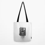A Kodak Brownie analog vintage camera on a white background  Retro photography in black and white Tote Bag Gallery Image 2
