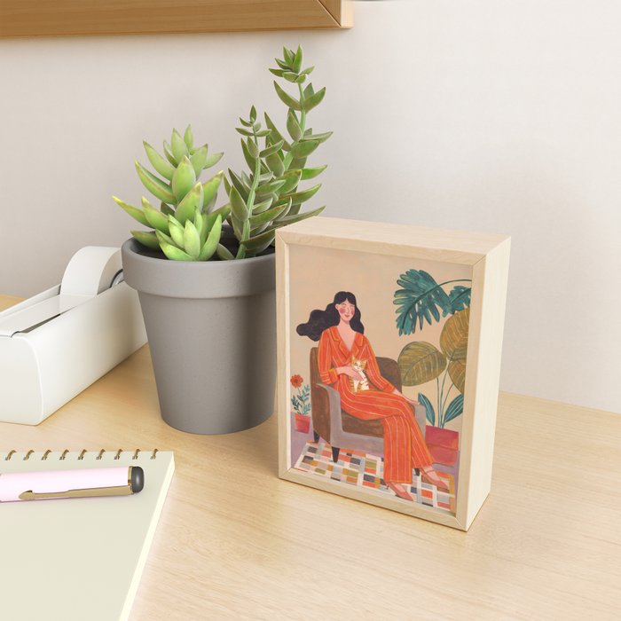 Woman with cat in living room in warm earth tones Mini Art Print Gallery Image 2