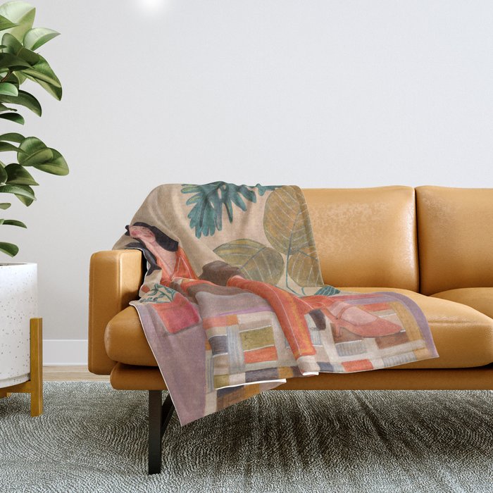 Woman with cat in living room in warm earth tones Throw Blanket Gallery Image 1