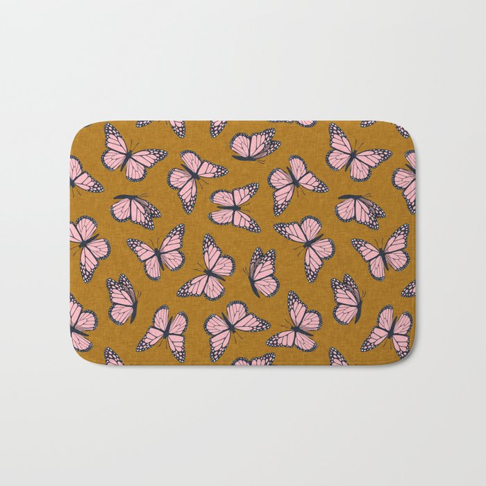 monarch butterflies - pink on ginger Bath Mat Gallery Image 1
