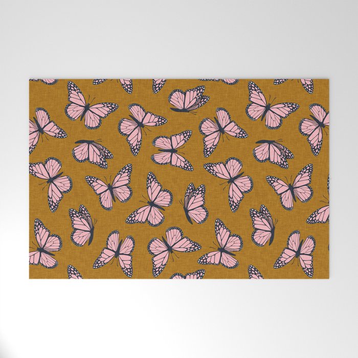 monarch butterflies - pink on ginger Welcome Mat Gallery Image 1