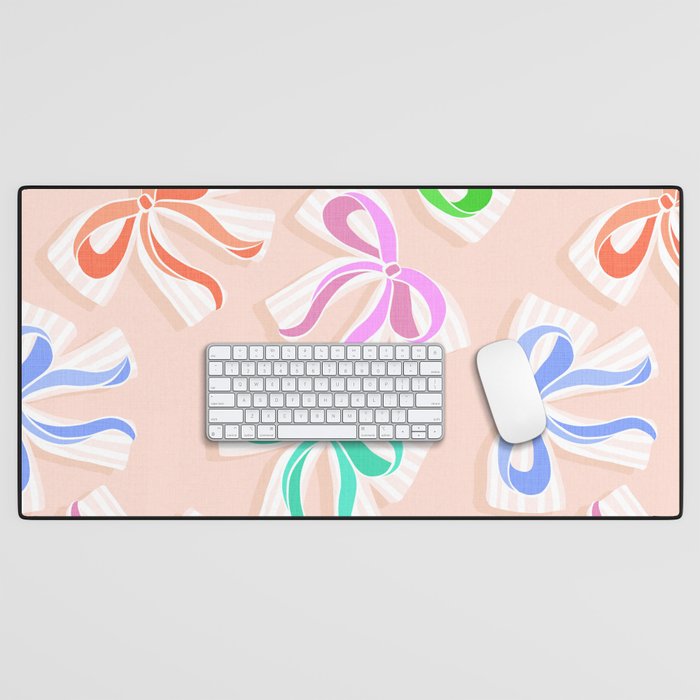 Ditsy Kitsch Ribbons and bows 1. Pastel Rainbow colours on Peach Desk Mat Gallery Image 1