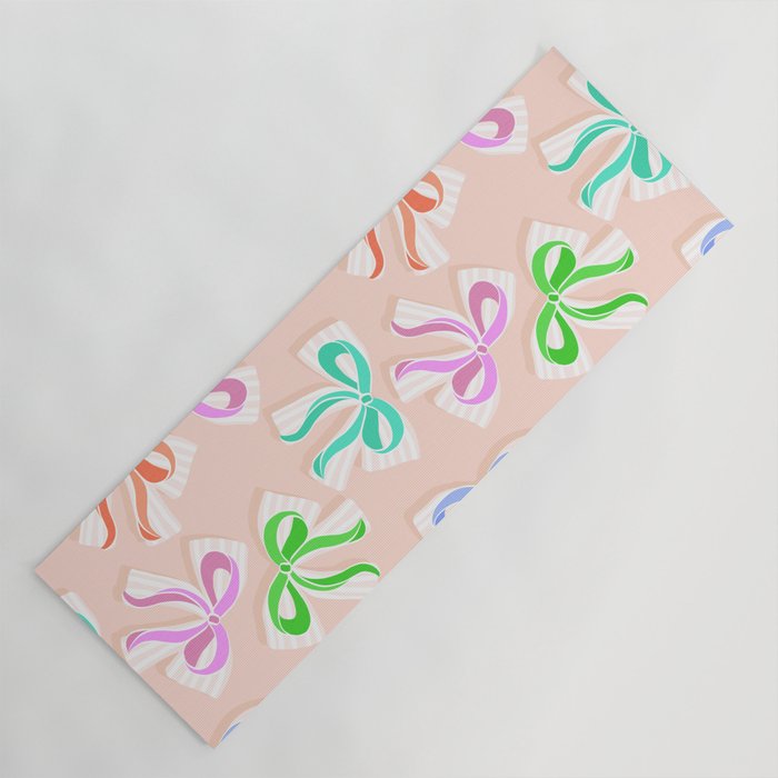 Ditsy Kitsch Ribbons and bows 1. Pastel Rainbow colours on Peach Yoga Mat Gallery Image 1