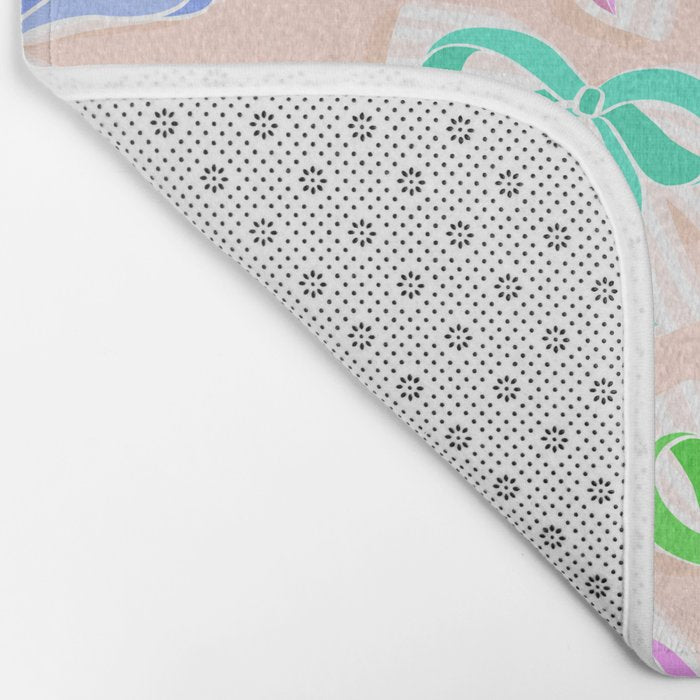 Ditsy Kitsch Ribbons and bows 1. Pastel Rainbow colours on Peach Bath Mat Gallery Image 2