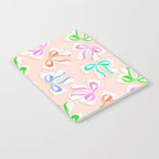 Ditsy Kitsch Ribbons and bows 1. Pastel Rainbow colours on Peach Notebook Gallery Image 2