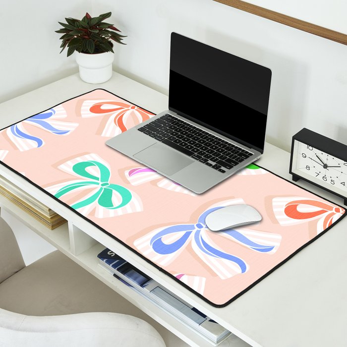 Ditsy Kitsch Ribbons and bows 1. Pastel Rainbow colours on Peach Desk Mat Gallery Image 2