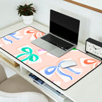 Ditsy Kitsch Ribbons and bows 1. Pastel Rainbow colours on Peach Desk Mat Gallery Image 2