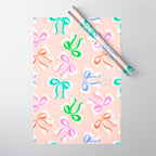 Ditsy Kitsch Ribbons and bows 1. Pastel Rainbow colours on Peach Wrapping Paper Gallery Image 1